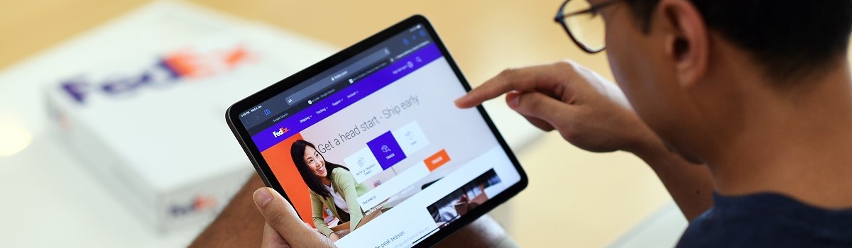 pointing to online product on tablet