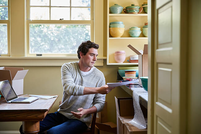 home-business-owner-checking-packing-list