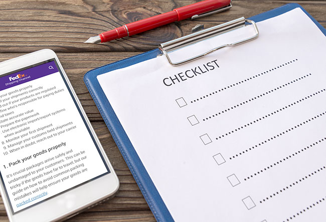 control sheet on the tablet, smartphone. A handle on a wooden background with a tola. business. finance. planning