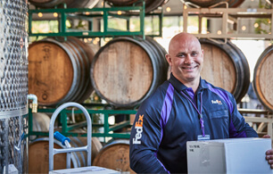 FedEx worker in a wine cellar