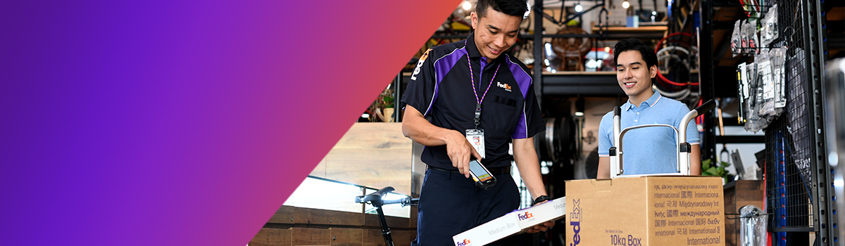 Two men looking at shipping labels