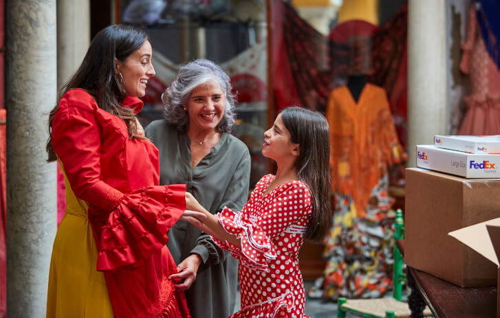 three generations of women standing together