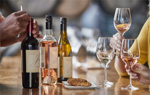 people at a table drinking wine