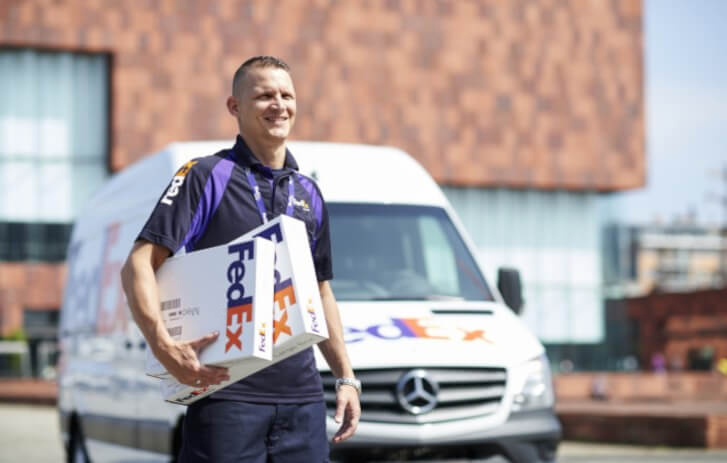 FedEx Worker carrying packages