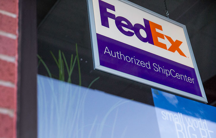 FedEx building with a sign in the window