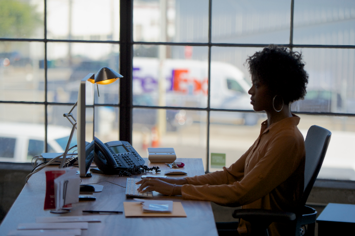 Woman working at her desk