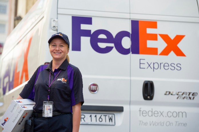 FedEx Express courier delivering package