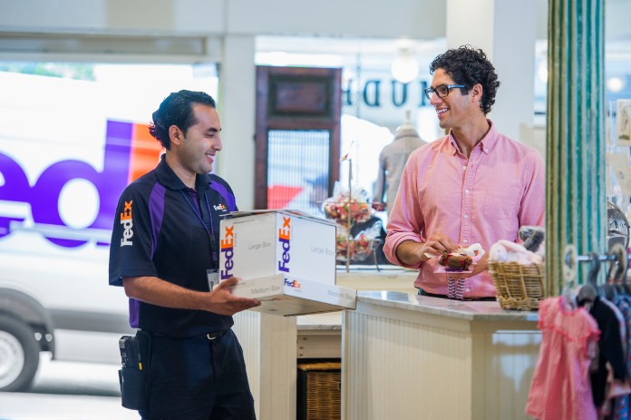 FedEx team member picking up packages