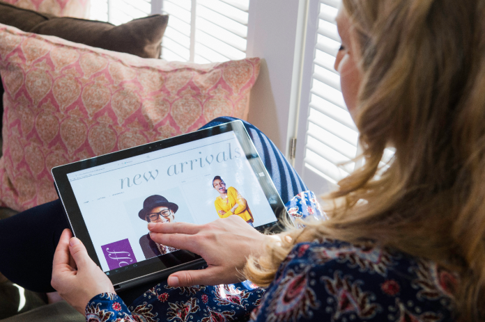 Woman browsing the web on her tablet