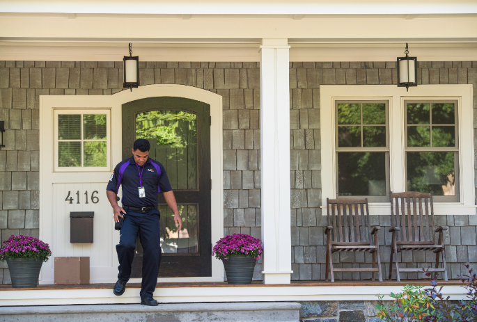 FedEx courier walking with package