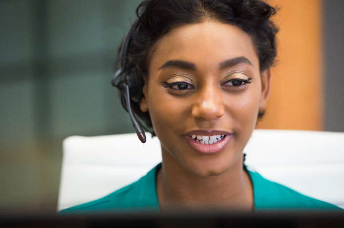 Smiling woman with headset
