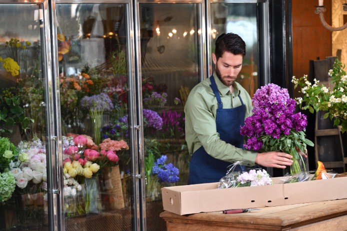 man holding flowers