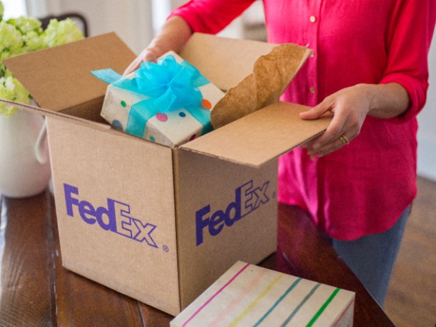 Woman putting package together
