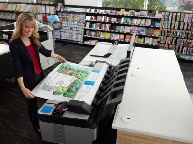 Pulling a map from the printer Customer pulling a map from the printer
