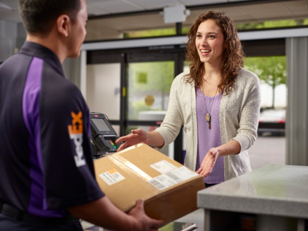 A customer drops off a return shipment
