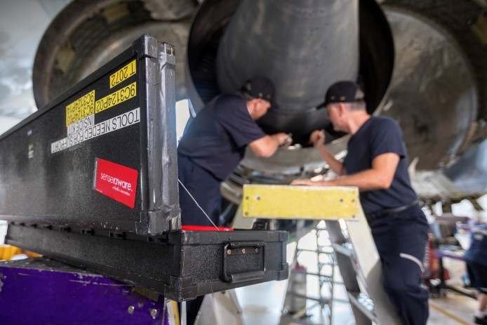 United employees work on a repair