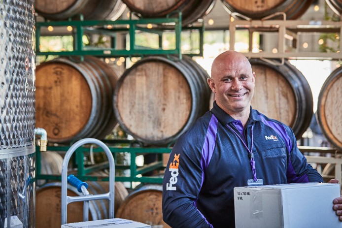 FedEx employee delivering special care products