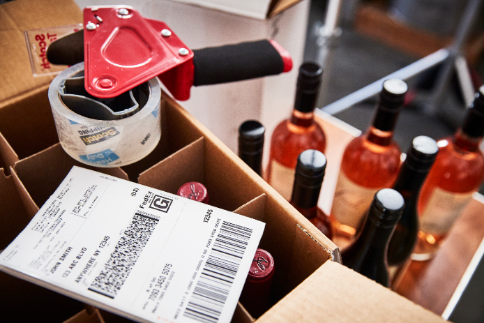 Wine bottles getting prepped to ship