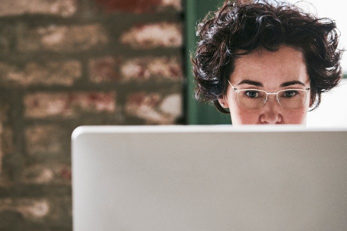 Woman using computer.