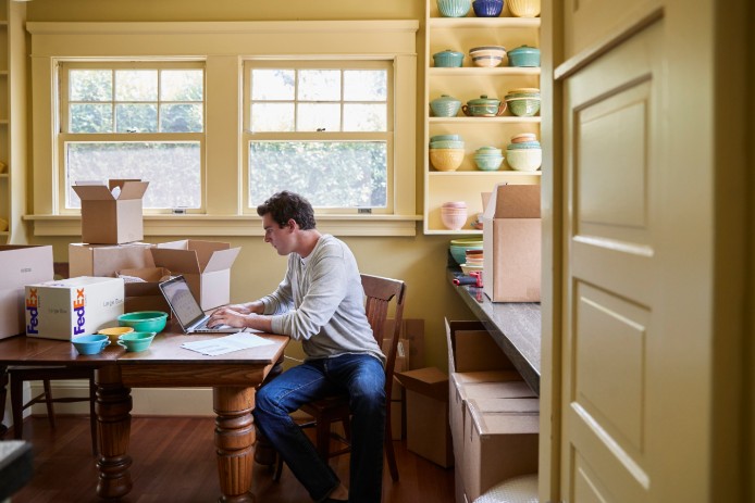 man looking at computer