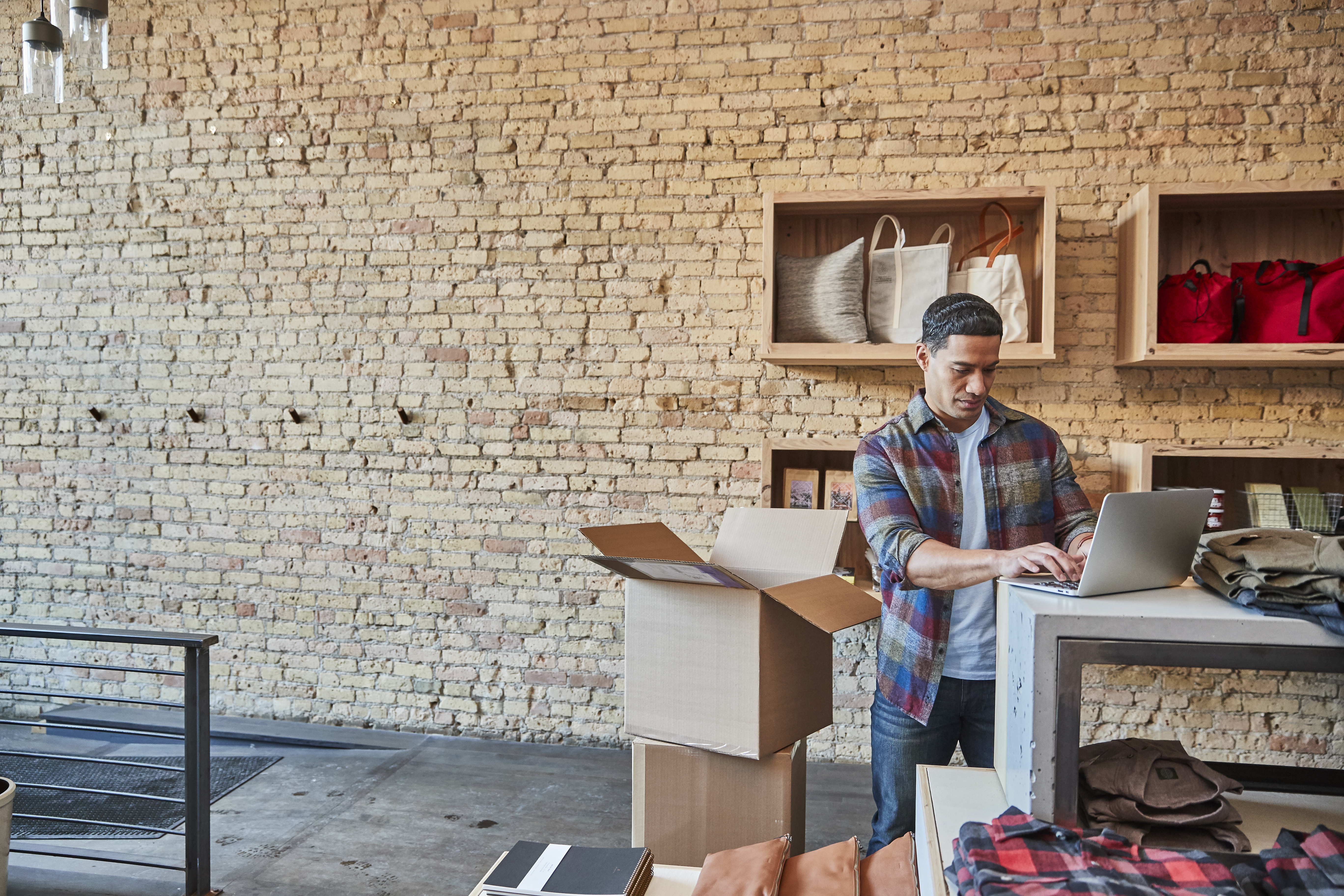 man opening fedex package