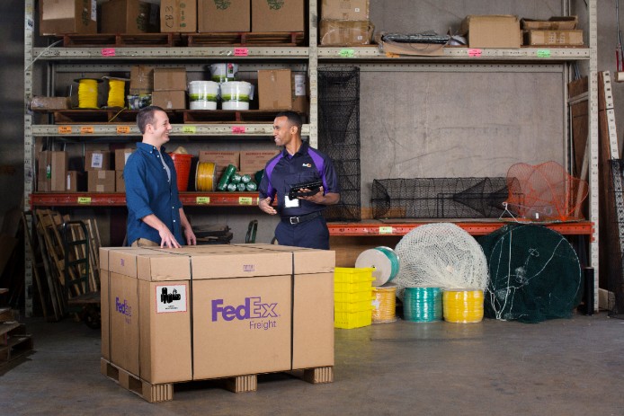 FedEx Freight driver with customer
