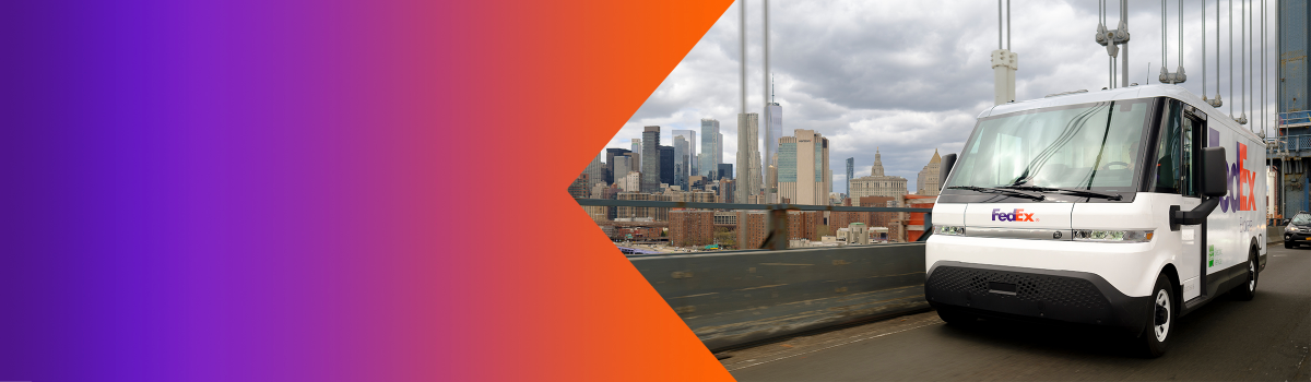 FedEx van driving across a bridge with the New York City skyline in the background