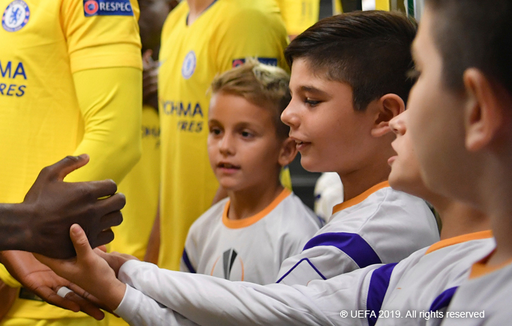 Player Mascots shaking hands