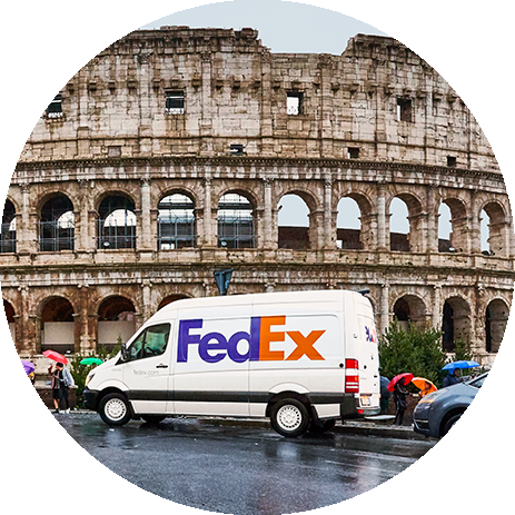FedEx van on the street in front of the Colosseum