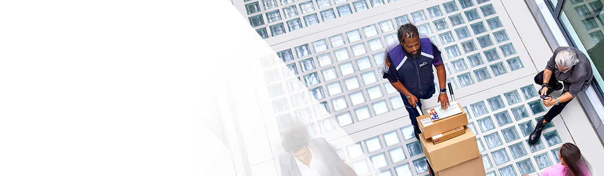 FedEx Courier walking down with FedEx boxes