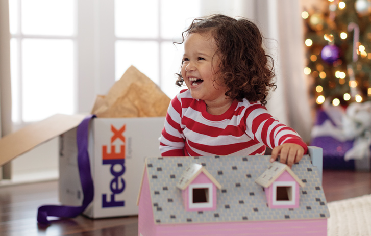 Toddler With toy house