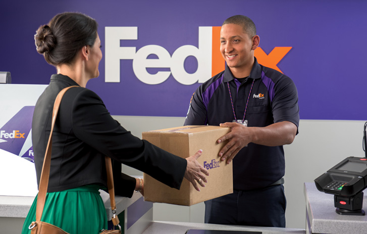 FedEx customer receiving package