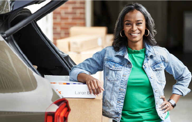 Woman with FedEx package