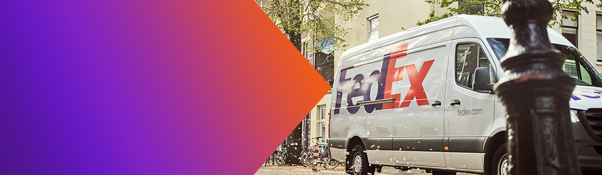 FedEx Van driving down a street