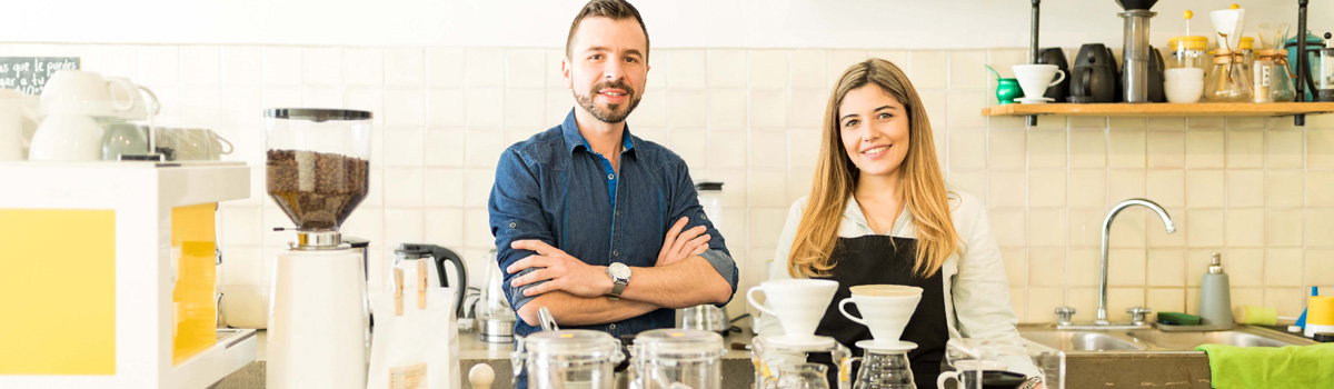 man and woman in coffee bar