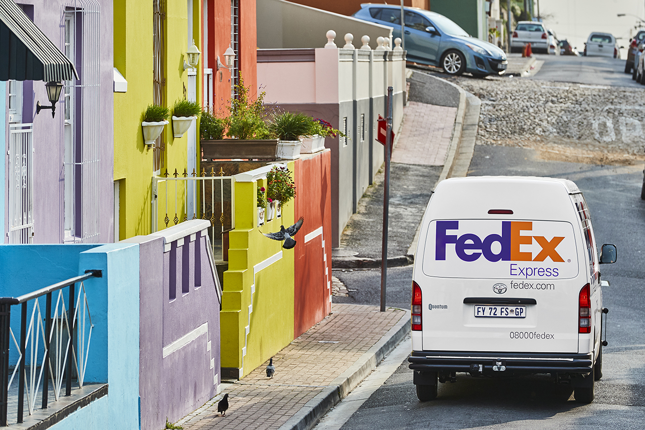 FedEx van driving through a neighborhood in Cape Town