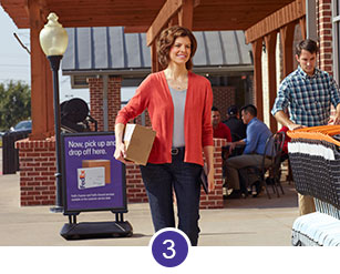 A woman dropping off brown box at a location