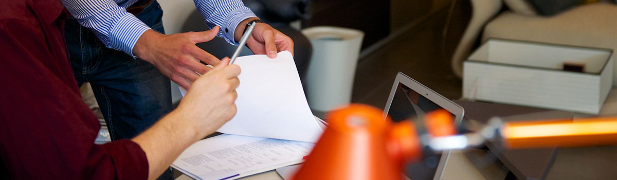 Business group signing documents