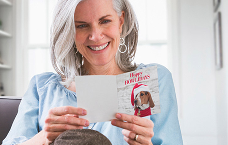 A woman reading a card