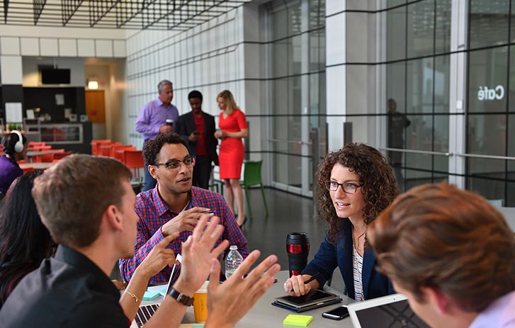 A group of people having a meeting