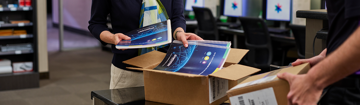 FedEx Office customer getting manuals