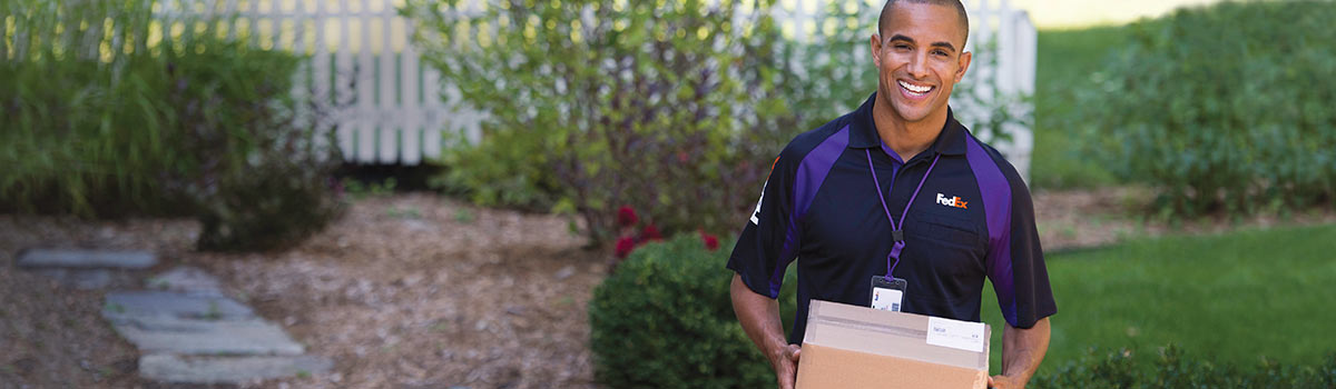 FedEx Delivery Man holding a package