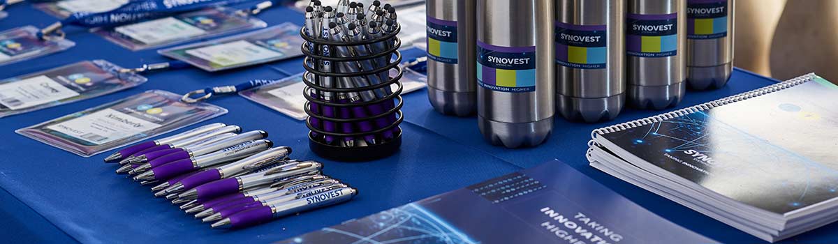 Table of printed products at a trade show