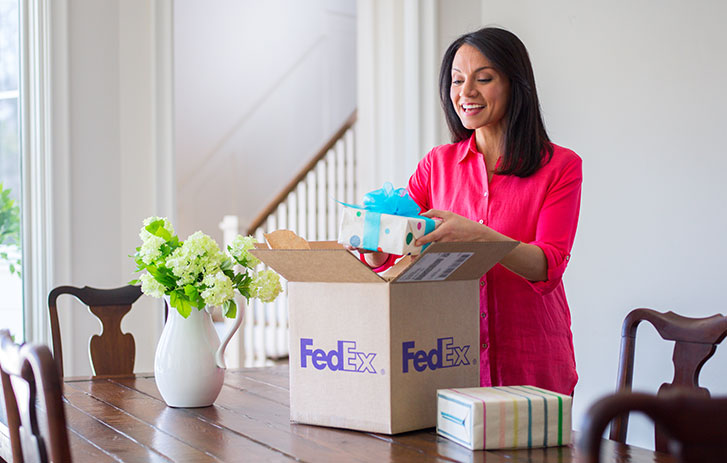 Woman opening package
