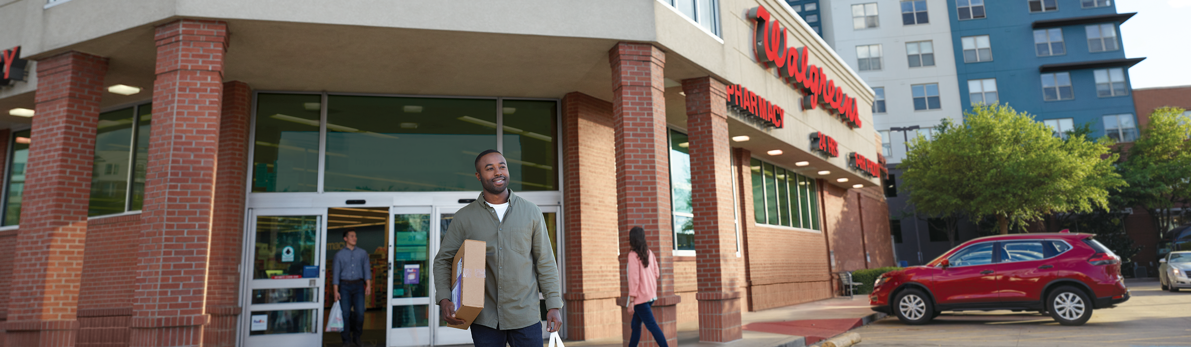 Customer picking up package from a Walgreens location