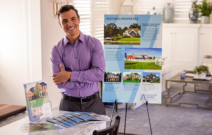 Customer standing in front of various print products