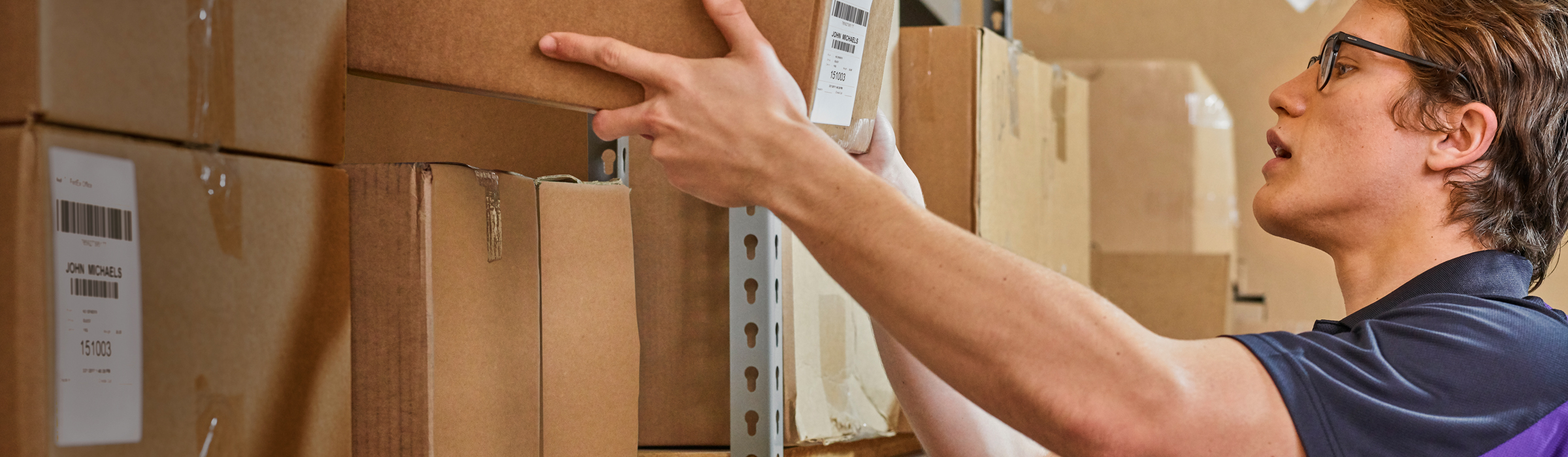 FedEx Employee handling a package