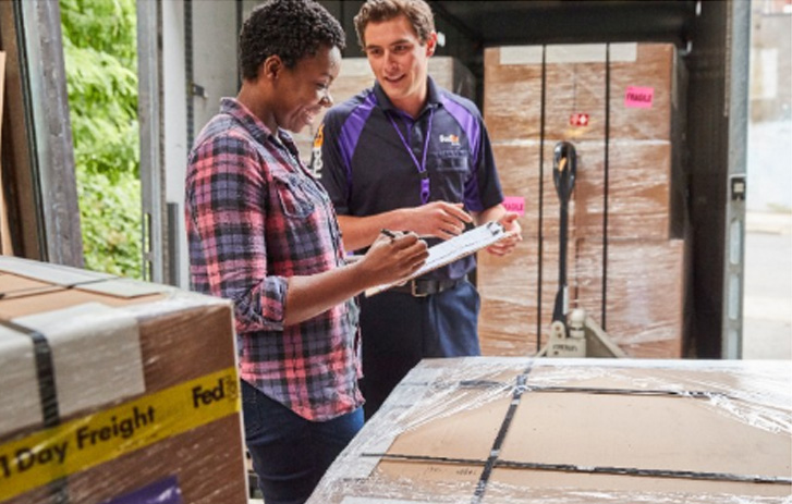 Customer filling out FedEx freight forms