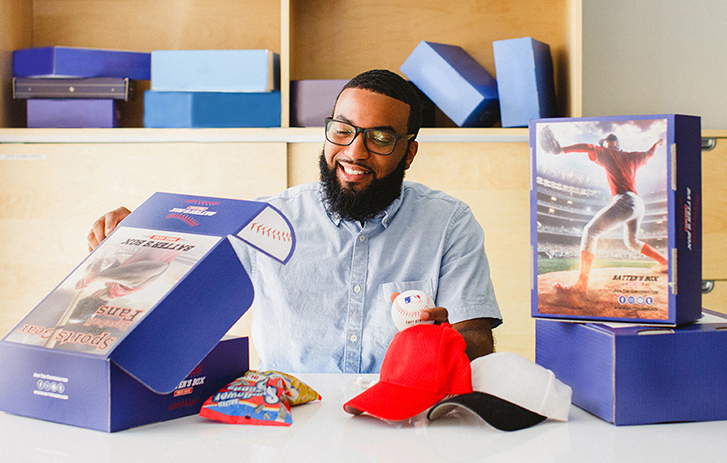 sports company owner with custom branded boxes from FedEx