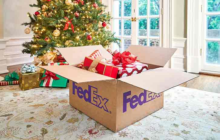 FedEx shipping box with gifts inside